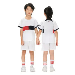 The children's training suit has a white and red front chest