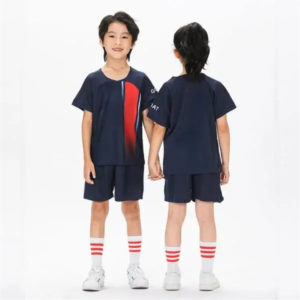 The children's training suit is navy blue with red stripes